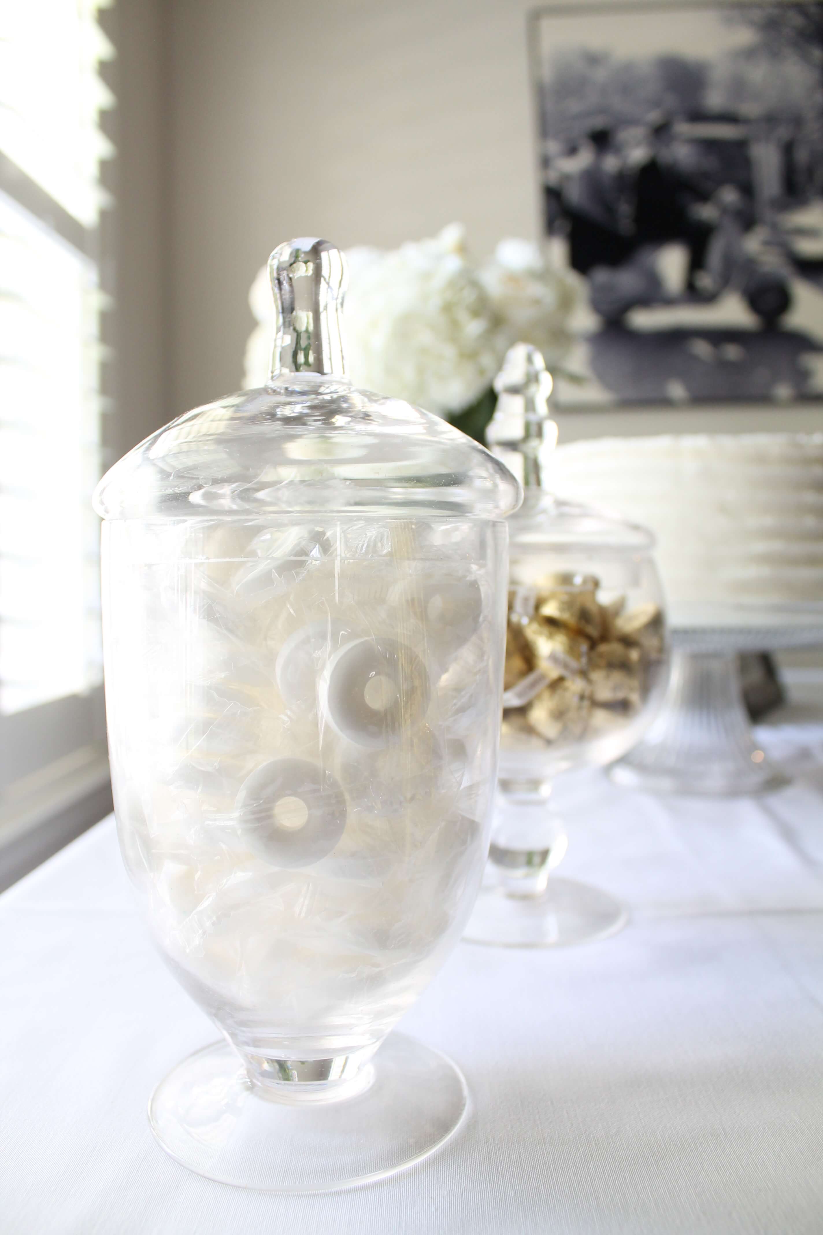 A gender neutral baby shower sprinkle. All the details from an elegant and simple shower in a color scheme of white, gray, and gold.