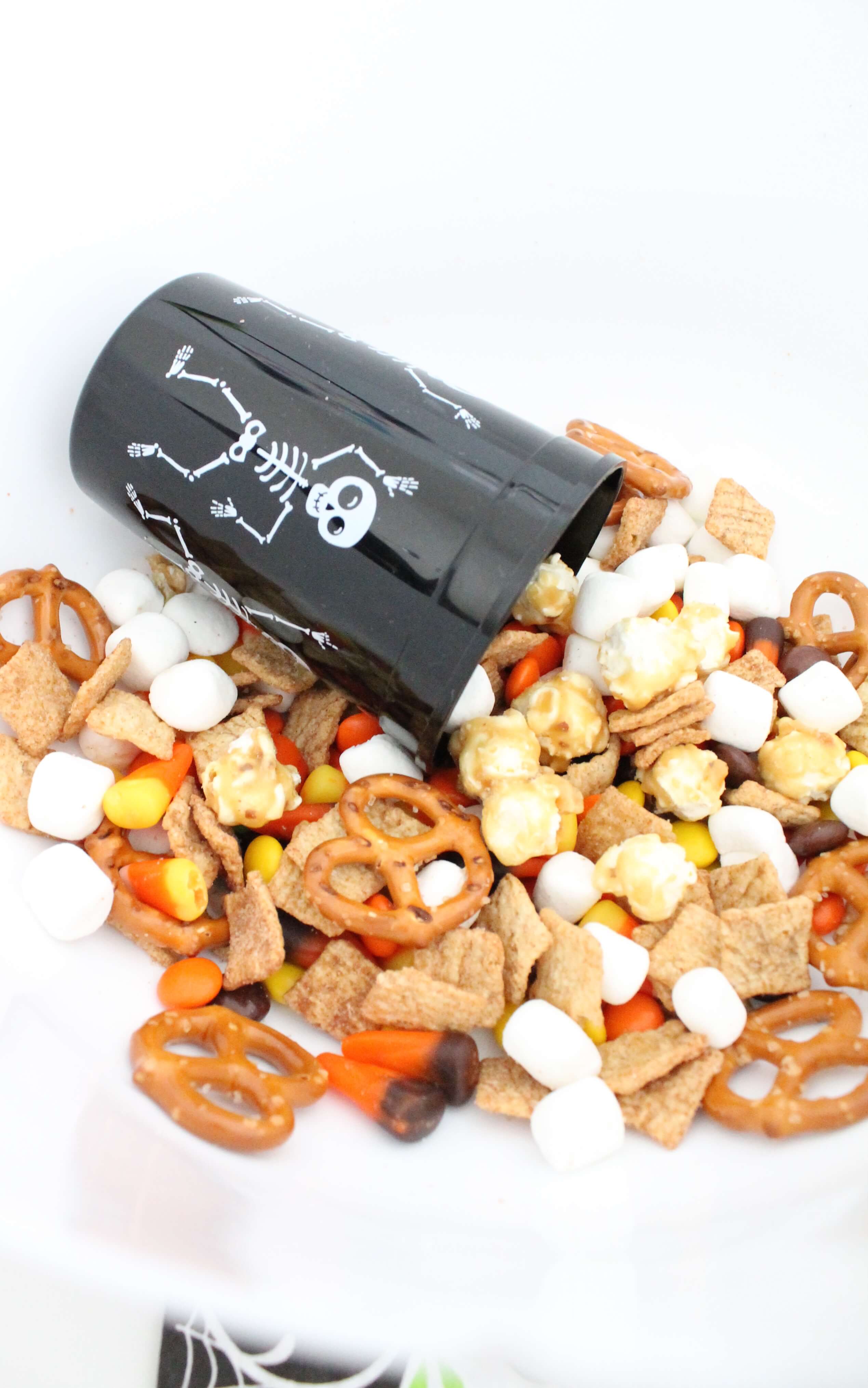 Kid-approved, fall-inspired snack mix. The perfect mix of salty and sweet. Perfect for party mix for Dia de los Muertos, Halloween, or any festive fall party. 