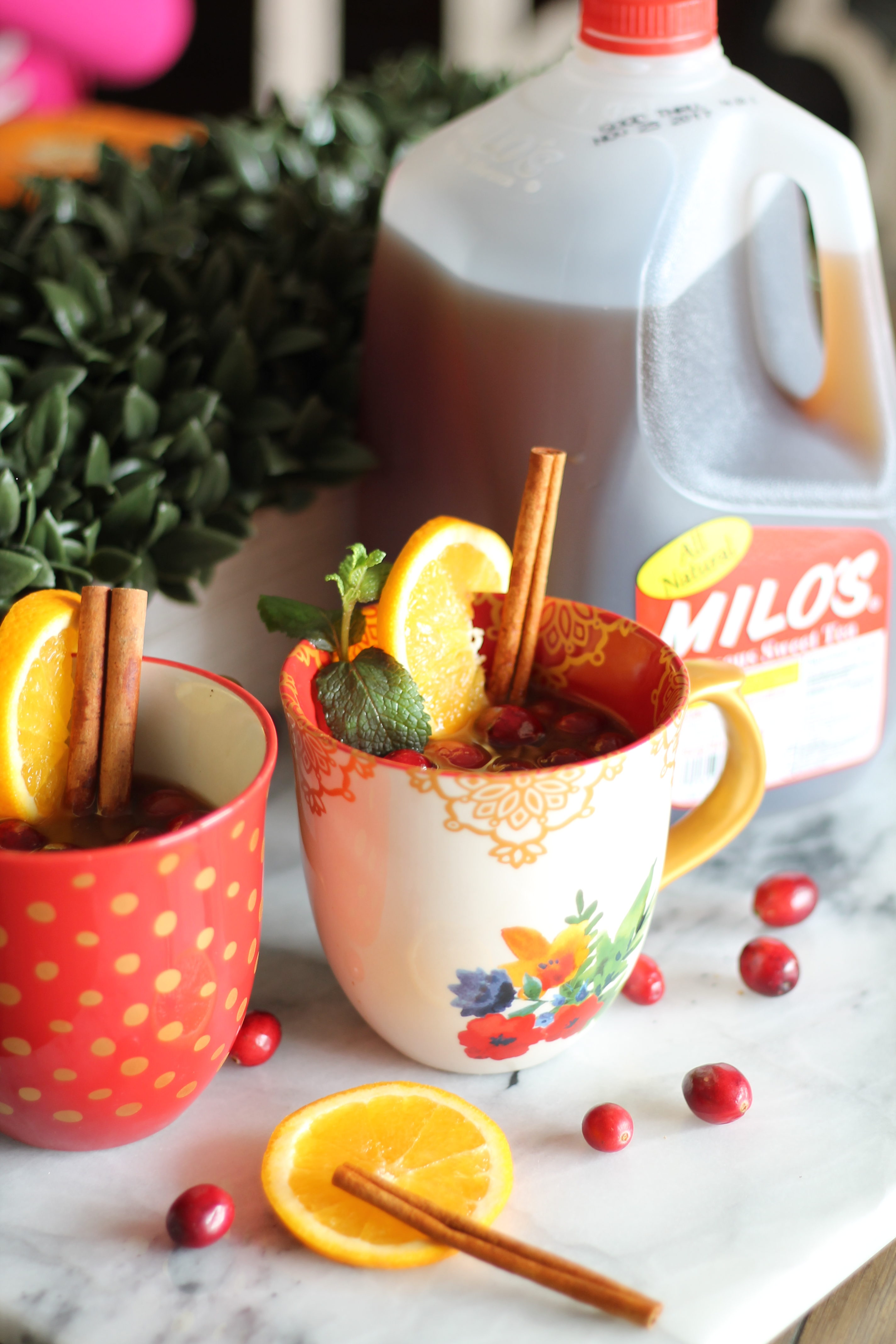 Hostess Tips for the Holidays :: How to stress less and enjoy the holidays more! You also can't miss this hot Milo's Tea with cranberries and cinnamon, apple juice and cranberry juice. So yummy! AD #passthemilos #hotapplecidertea