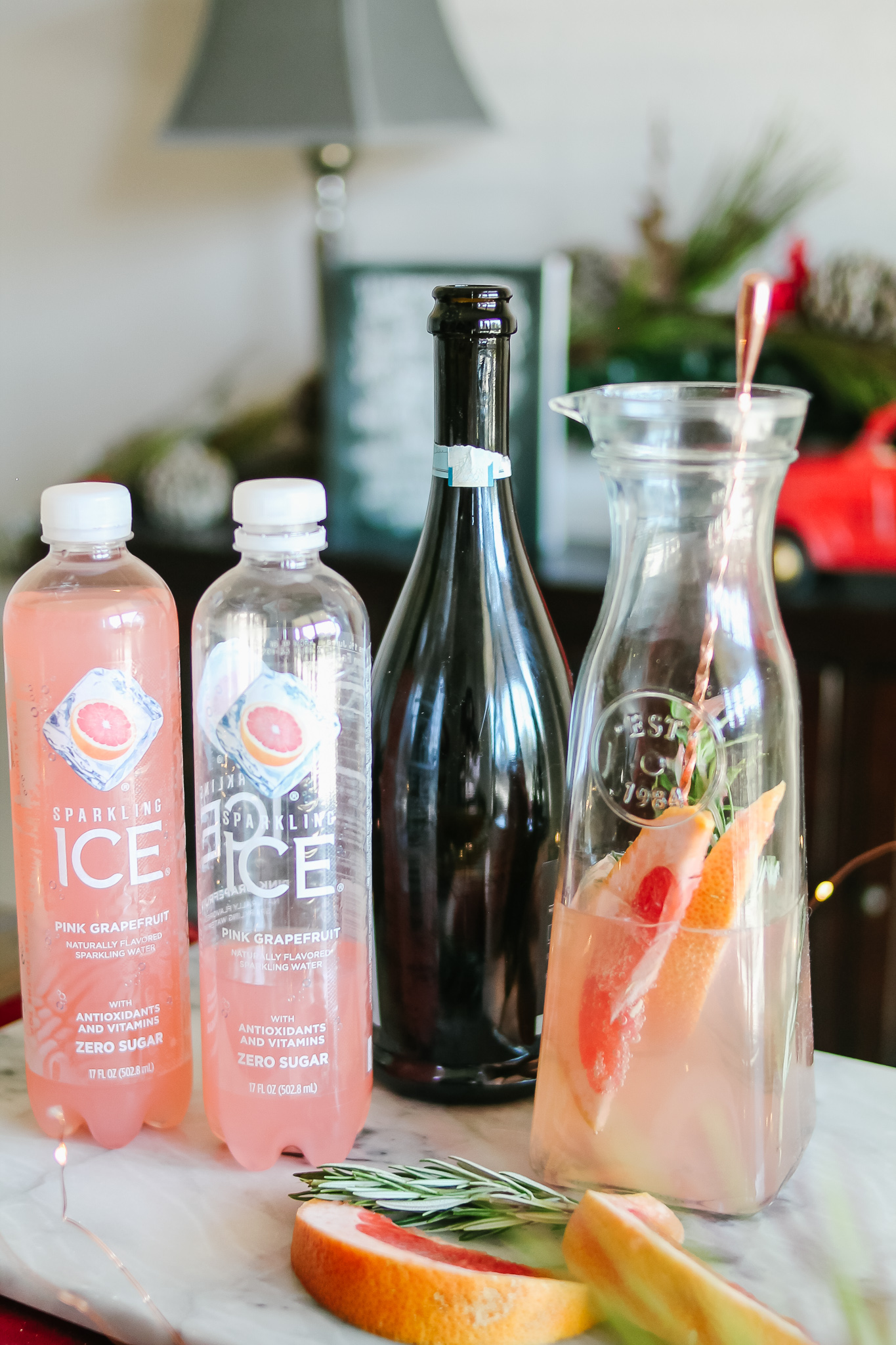 The easiest, sparkling Grapefruit & Rosemary Christmas Cocktail! With @SparklingICE #ad #GetFizzy #SparklingIceLife #SparklingFestivities #HolidayDrinks