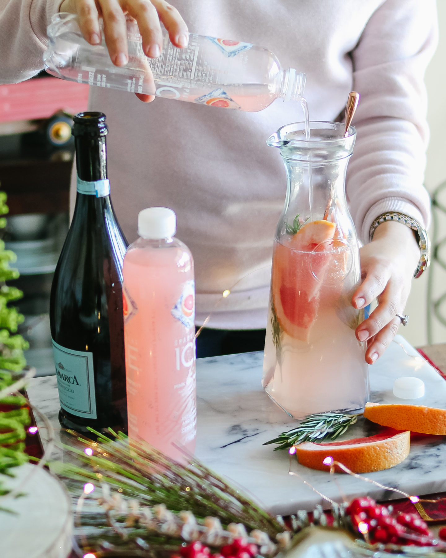 The easiest, sparkling Grapefruit & Rosemary Christmas Cocktail! With @SparklingICE #ad #GetFizzy #SparklingIceLife #SparklingFestivities #HolidayDrinks