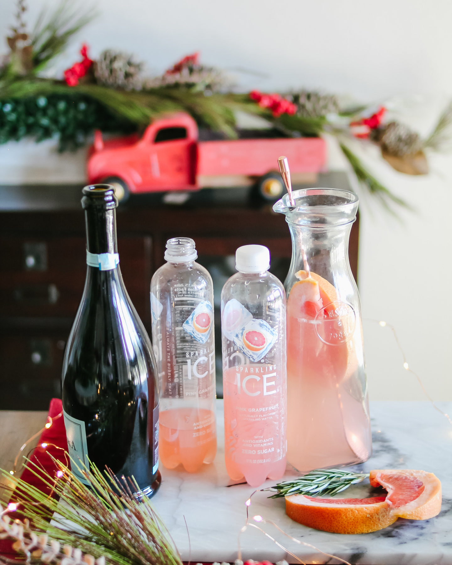 The easiest, sparkling Grapefruit & Rosemary Christmas Cocktail! With @SparklingICE #ad #GetFizzy #SparklingIceLife #SparklingFestivities #HolidayDrinks