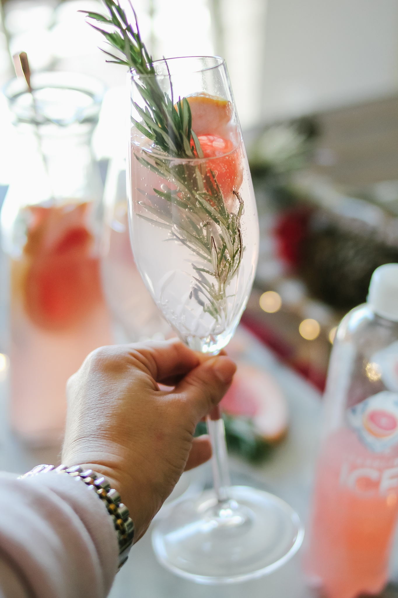 The easiest, sparkling Grapefruit & Rosemary Christmas Cocktail! With @SparklingICE #ad #GetFizzy #SparklingIceLife #SparklingFestivities #HolidayDrinks
