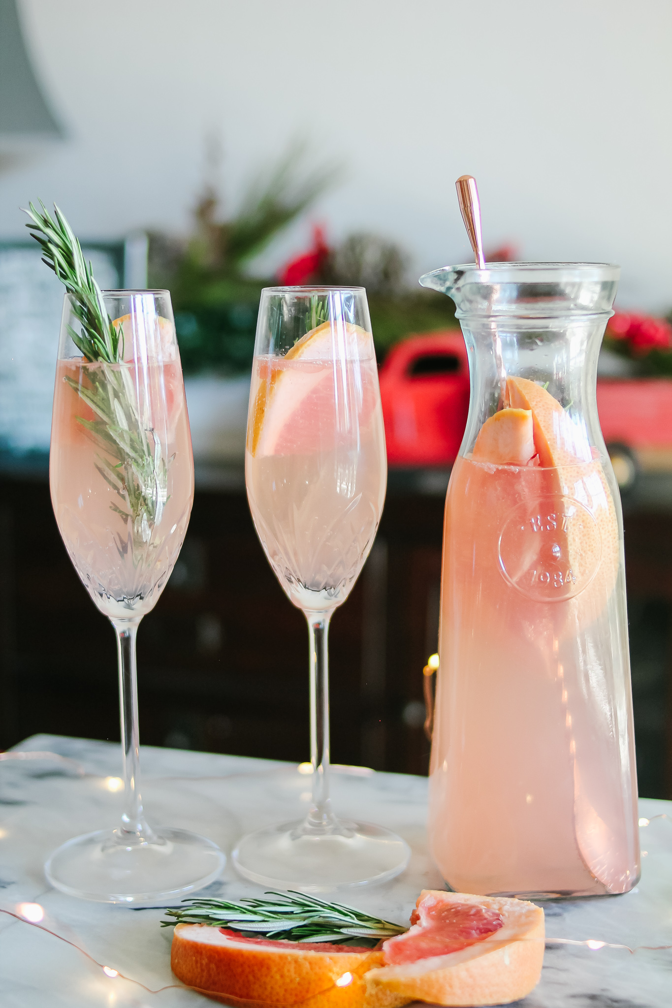 The easiest, sparkling Grapefruit & Rosemary Christmas Cocktail! With @SparklingICE #ad #GetFizzy #SparklingIceLife #SparklingFestivities #HolidayDrinks