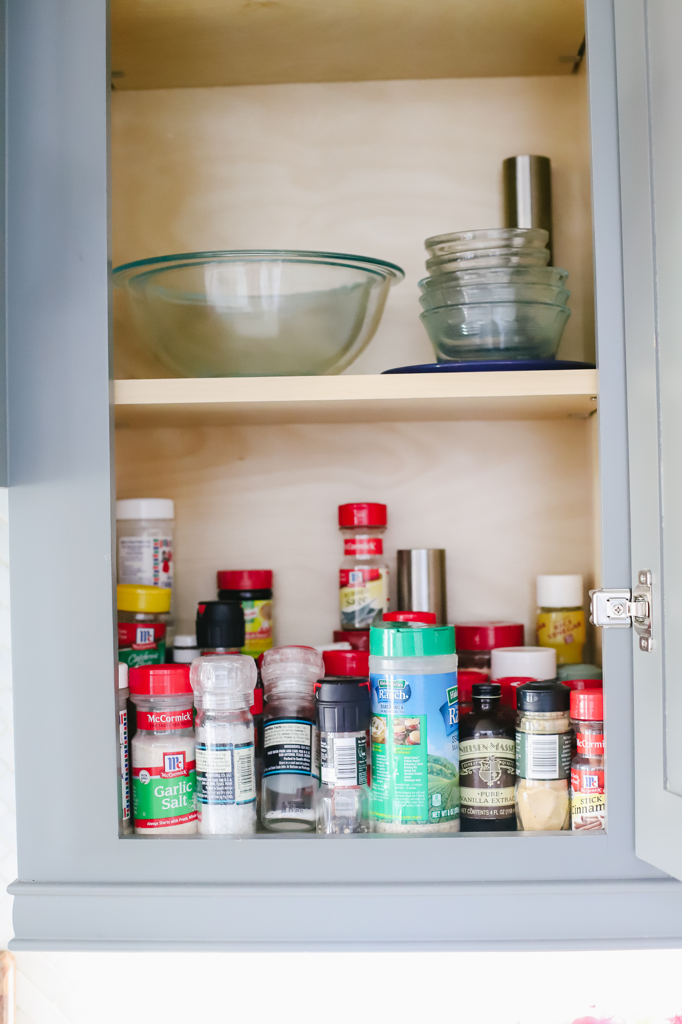 Want organized kitchen cabinets? Shelf Genie can help you clear the clutter  and mess