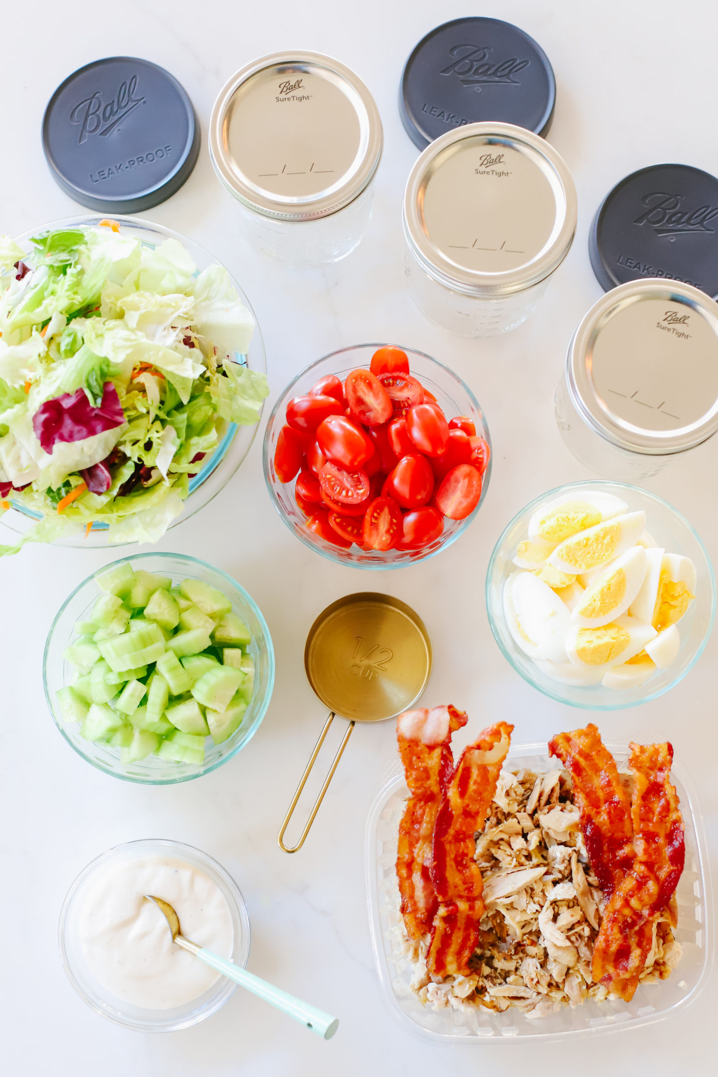 Meal prep with Ball® Jars to create the perfect Cobb Salad (Keto & Whole30® approved)! Add an easy and nutritious salad to your meal prep routine, always ready to go to help you stay on track! It's the perfect mason jar salad. #ad #Whole30WithBall #MadeWithBall #BallJars #Whole30Diet #BallInAJar @BallCanning