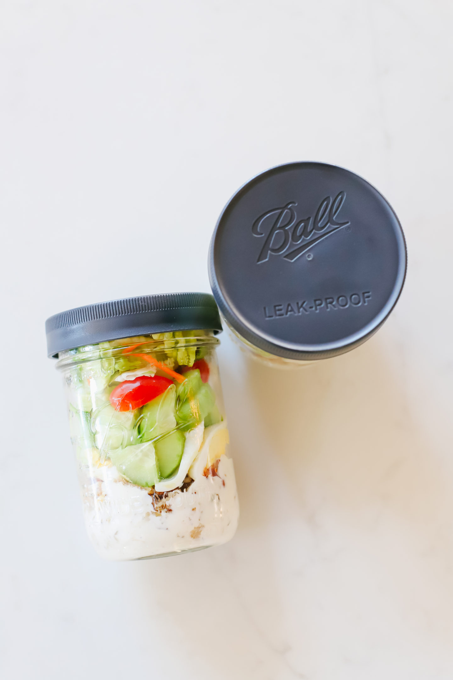 Meal prep with Ball® Jars to create the perfect Cobb Salad (Keto & Whole30® approved)! Add an easy and nutritious salad to your meal prep routine, always ready to go to help you stay on track! It's the perfect mason jar salad. #ad #Whole30WithBall #MadeWithBall #BallJars #Whole30Diet #BallInAJar @BallCanning